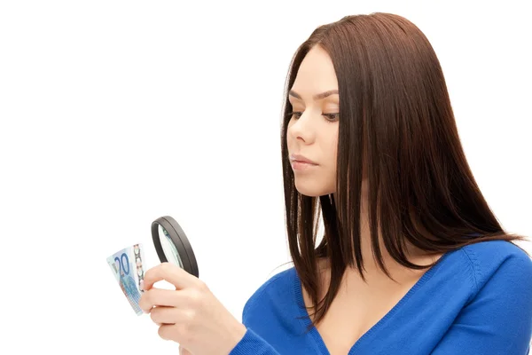 Woman with magnifying glass and euro cash money — Stock Photo, Image