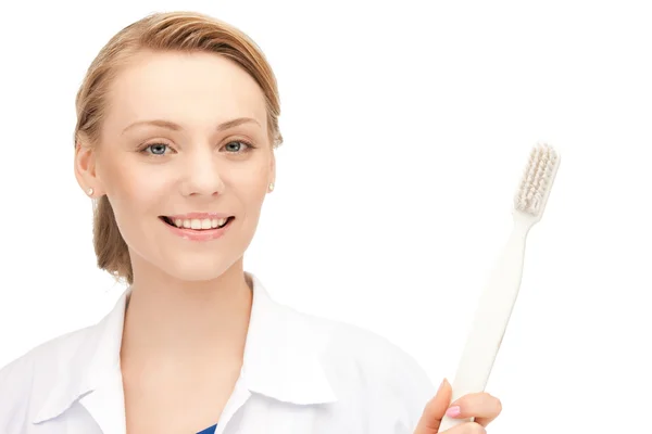 Doctor with toothbrush — Stock Photo, Image