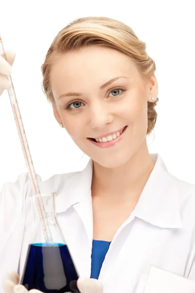 Lab worker holding up test tube — Stock Photo, Image