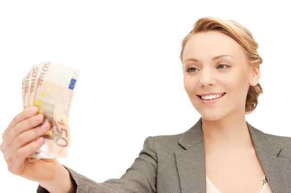 Härlig kvinna med euro i kontanter — Stockfoto