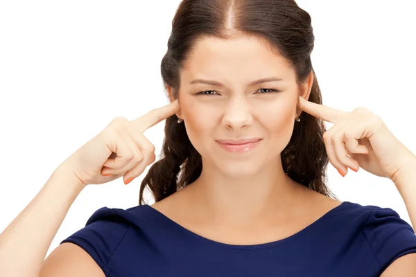 Mujer con dedos en las orejas —  Fotos de Stock