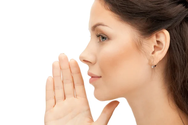 Woman whispering gossip Stock Picture