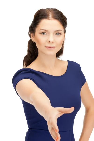 Kvinna med en öppen hand redo för handskakning — Stockfoto