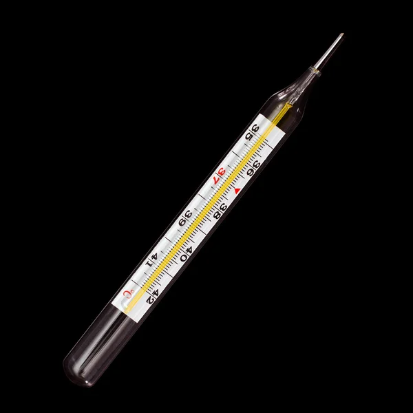 Termômetro de vidro médico isolado em fundo preto — Fotografia de Stock