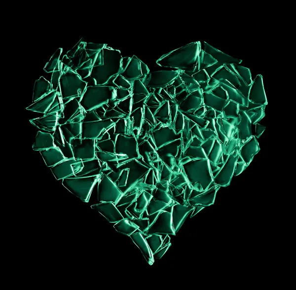 Broken green glass heart isolated on black background — Stock Photo, Image