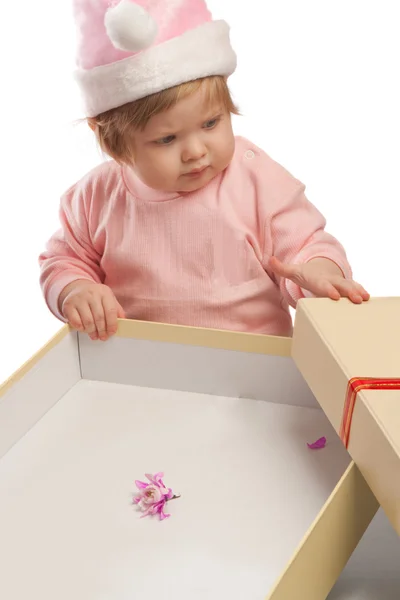 Kid looks at empty present box — Stock Photo, Image