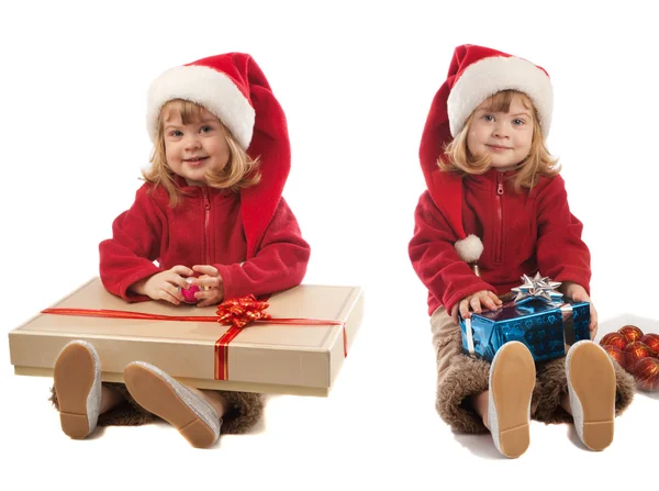 Duas meninas com caixas de presente — Fotografia de Stock