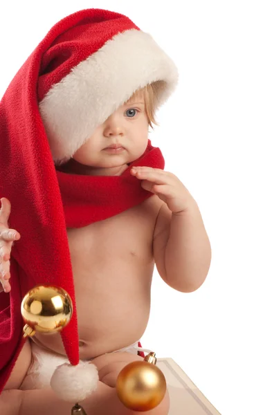Kid in Kerstman hoed en rode sjaal — Stockfoto