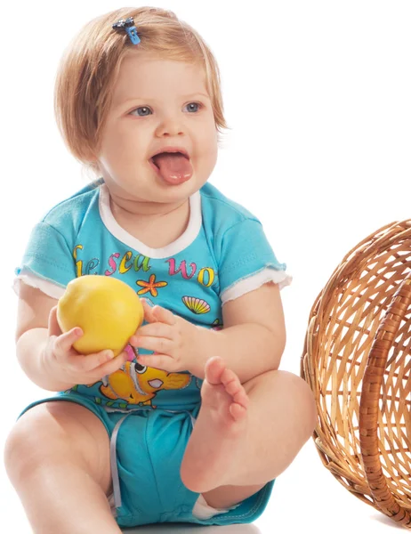 Baby with apple — Stockfoto