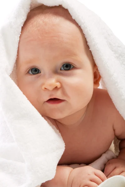 Baby covered with towel — Stock Photo, Image