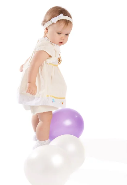Criança brincando com balões — Fotografia de Stock
