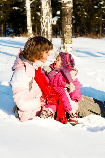 Mother and baby in snow — Stock Photo, Image