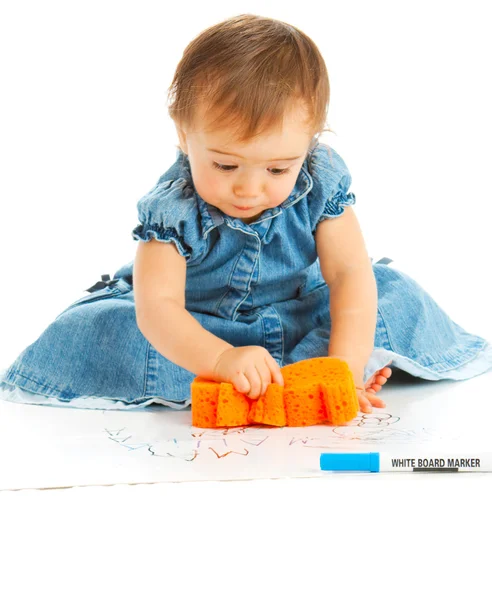 Kid wiping a board — Stock Photo, Image