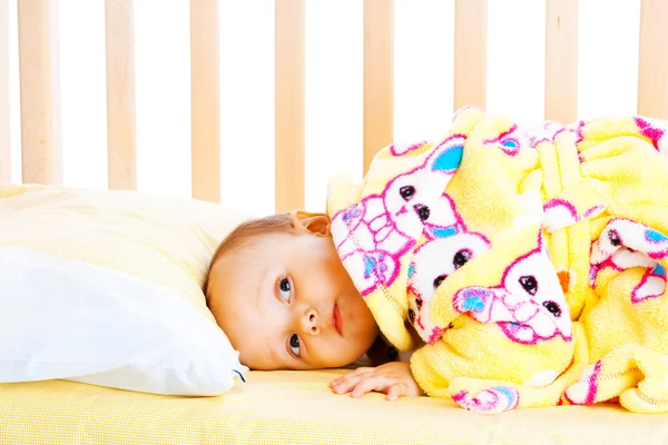 Baby in crib — Stock Photo, Image