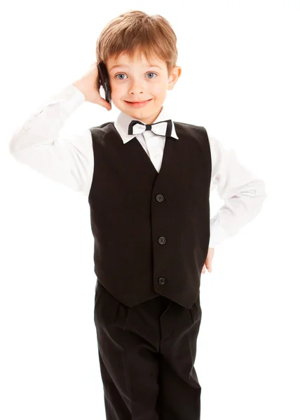 Preschool boy talking over smartphone — Stock Photo, Image