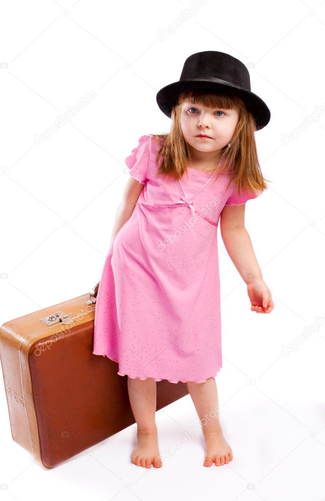 Kid carrying suitcase