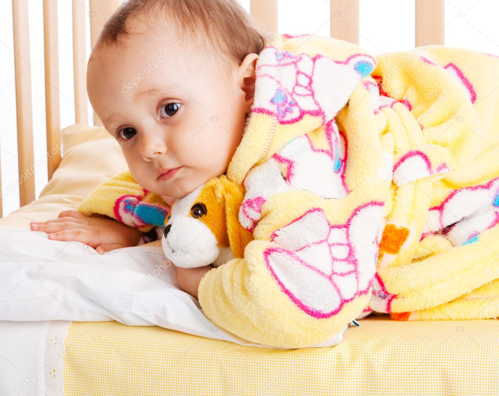 Baby in crib — Stock Photo © anatols 5759929