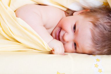 Baby in bed clipart