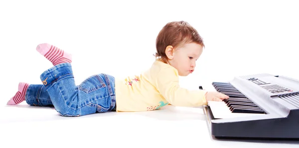 Baby playing synthesizer — Stock Photo, Image