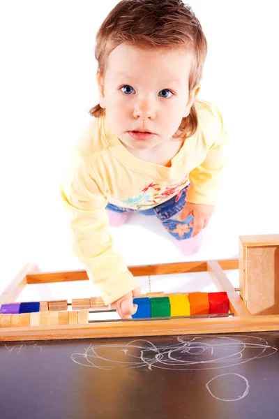 Toddler near blackboard — Stock Photo, Image