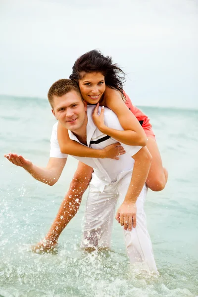 Man and woman in water — Stock Photo, Image