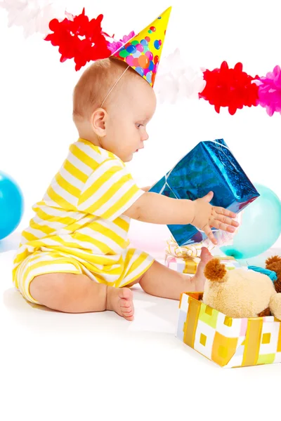 Baby with birthday present — Stock Photo, Image