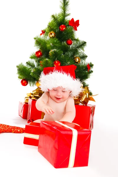 Desembalar presentes de Natal — Fotografia de Stock