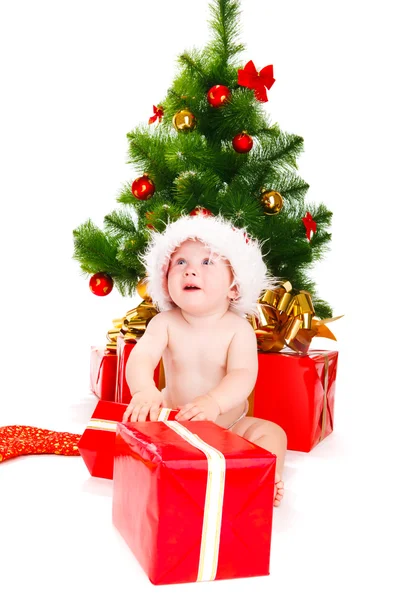 Erstauntes Weihnachtsbaby — Stockfoto