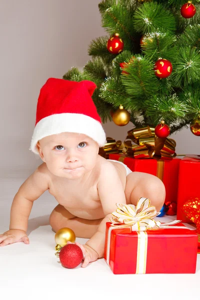 Gyerek karácsony kalapban — Stock Fotó