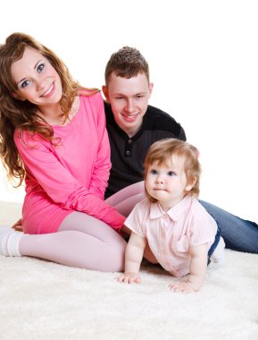 Young parents with baby daughter clipart