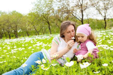 Smelling a flower clipart