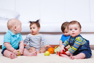 Four babies group clipart