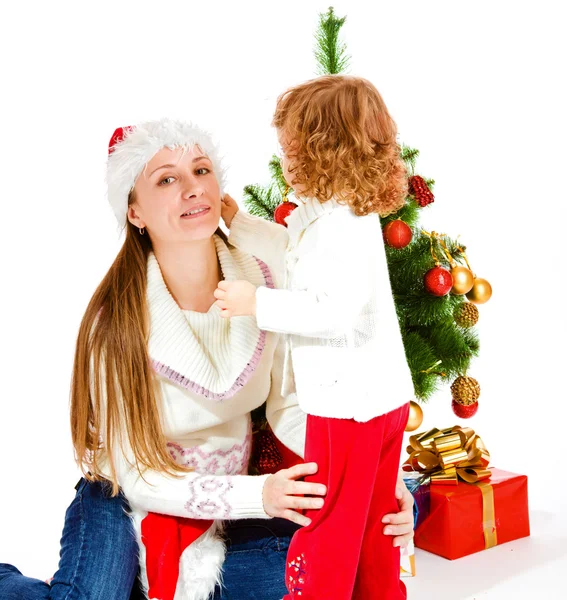 Filha e mãe em chapéu de Natal — Fotografia de Stock