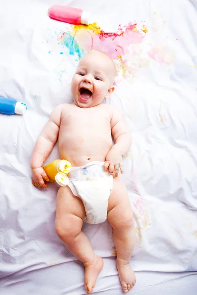 Baby with paints — Stock Photo, Image
