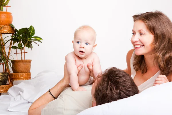 Parents playing with baby — Stock Photo, Image