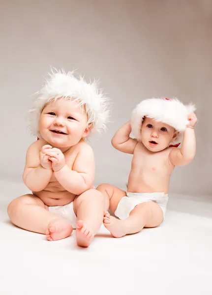 Lachende Weihnachtsbabys — Stockfoto