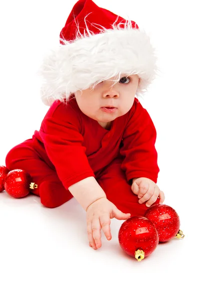 Funny baby in Kerstman hoed — Stockfoto