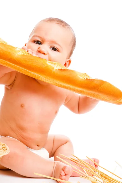 Baby biting bread — Stock Photo, Image