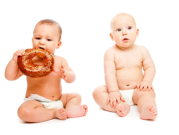 Babies with bread — Stock Photo, Image