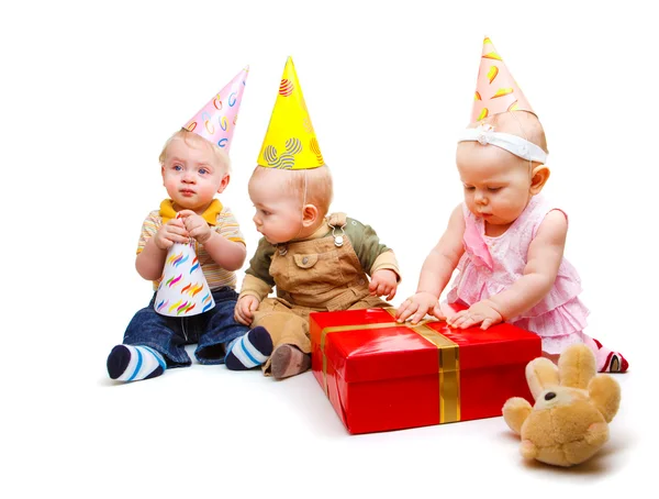 Toddlers in party hats — Stock Photo, Image