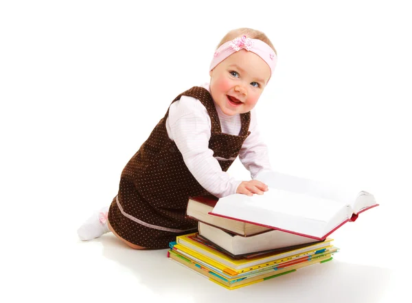 Baby with books — Stok fotoğraf