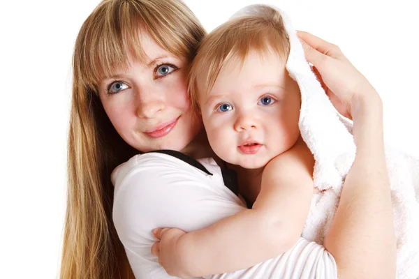 Mother and baby in towel — Stock Photo, Image