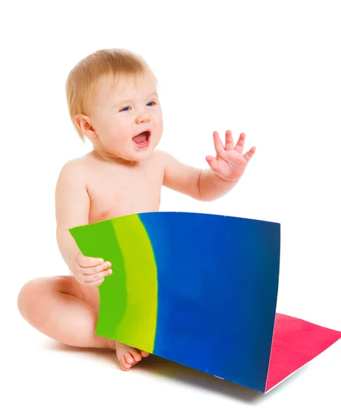 Happy baby with book — Stock Photo, Image