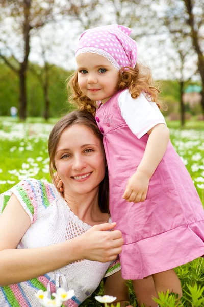 Girl embracing her mother — Stock Photo, Image