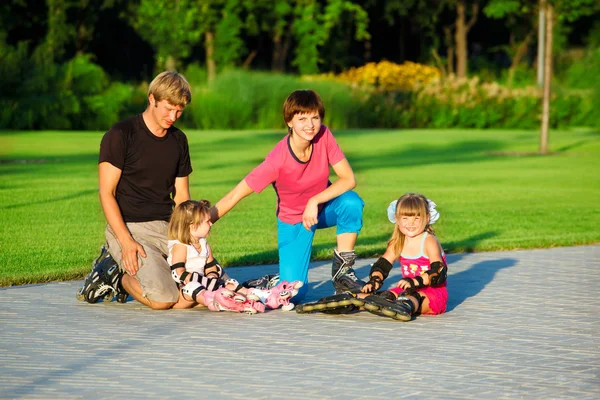 Family in roller skates — Stock Photo, Image