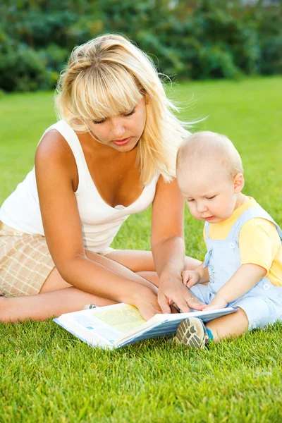 Mother and son in the backyard — Stock Photo, Image