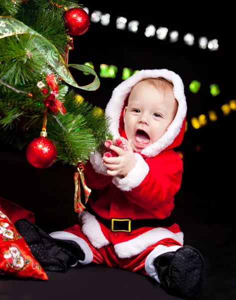 Giechelen santa baby — Stockfoto