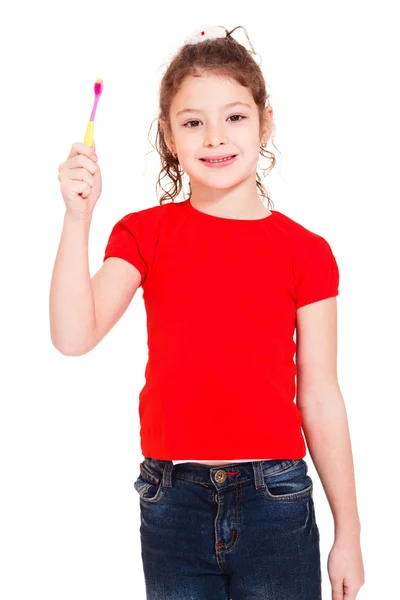 Дошкільна дівчина з зубною щіткою — стокове фото