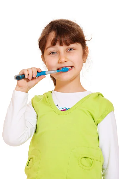 Girl cleaning her teeth — Stock Photo, Image