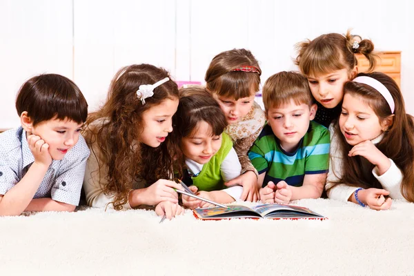Kids with book — Stock Photo, Image